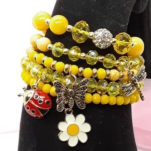 Set of 5 beaded charm bracelets